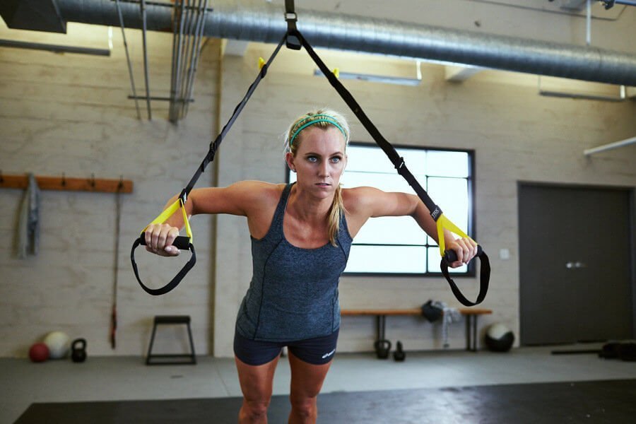 Genuine TRX Suspension Trainer photographed next to a counterfeit copy of the same model