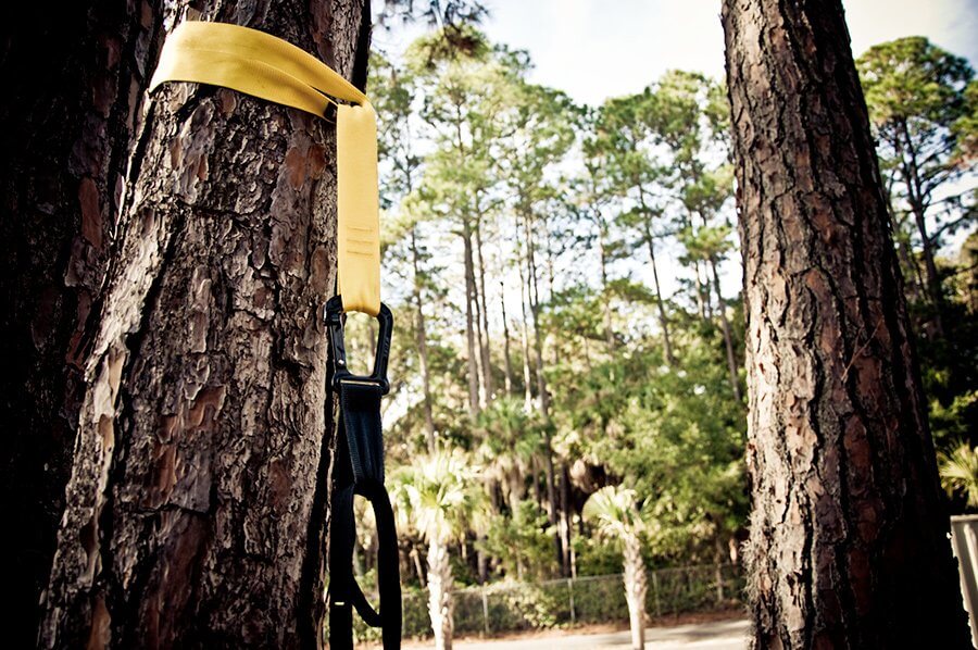 Different ways to anchor a TRX suspension trainer indoors and outdoors